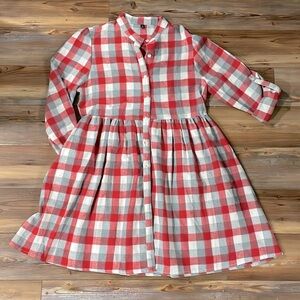Women’s Plaid Flannel Button Up Pleated Dress with Pockets and roll up sleeves.